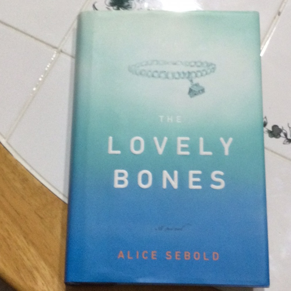 The Lovely Bones by Alice Sebold - Blue Cover Edition